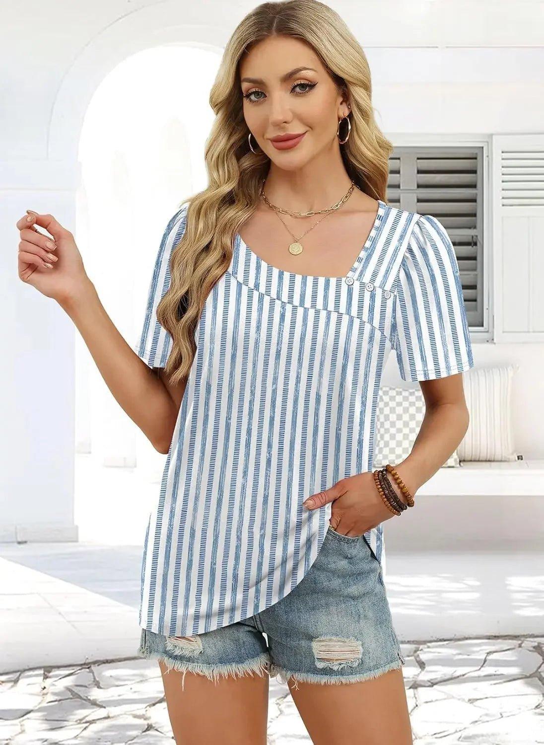 Woman in blue and white striped top with puff sleeves and distressed denim shorts