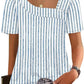 Blue and white striped women's blouse with puff sleeves and square neckline, paired with jeans