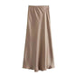 Elegant beige satin maxi skirt for women’s fashion, smooth drape and luxurious texture