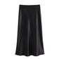 Black satin midi skirt for women, elegant fashion staple