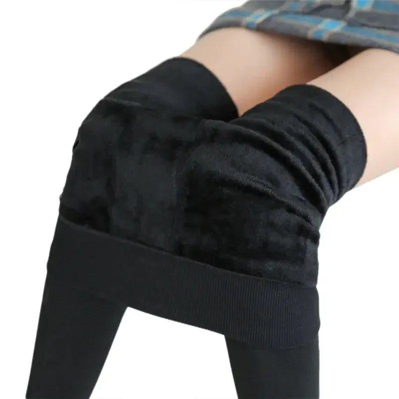 Black fleece-lined women's leggings with ribbed waistband, cozy winter fashion wear