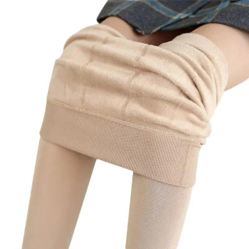 Beige thermal leggings with ribbed waistband, worn under plaid skirt for women's fashion