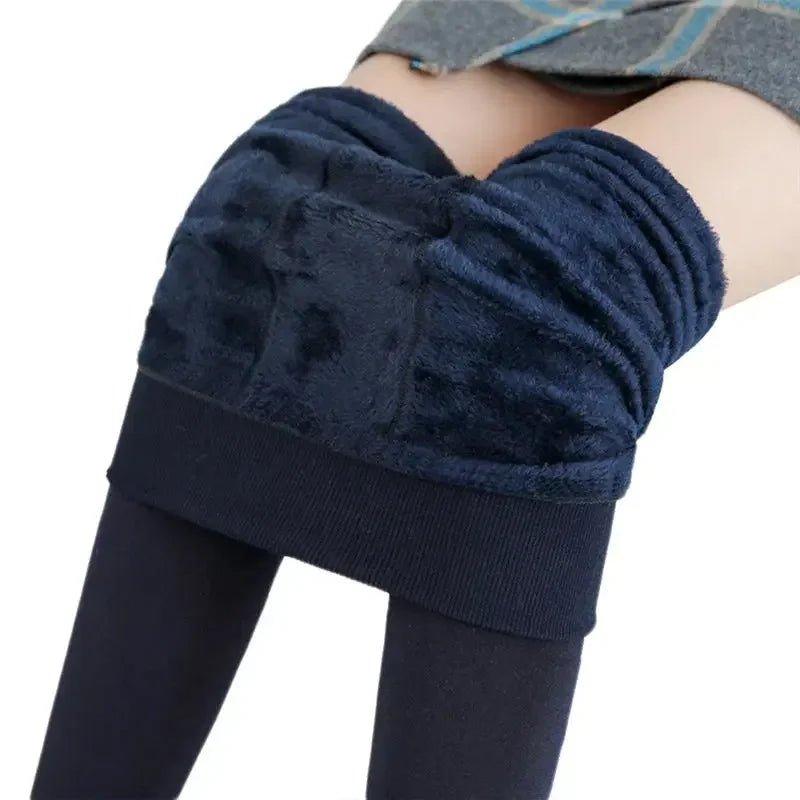 Women's navy blue fleece-lined thermal leggings with ribbed waistband for cozy winter fashion