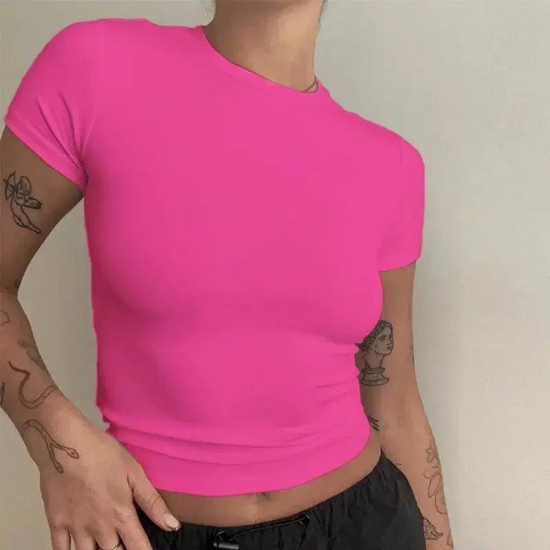Bright pink women's crop top with short sleeves, stylish and trendy fashion wear