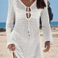 White crochet beach cover-up dress with long sleeves and V-neck tie, perfect for summer fashion