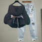 Black wrap top with bow belt and distressed patch jeans, women's fashion outfit