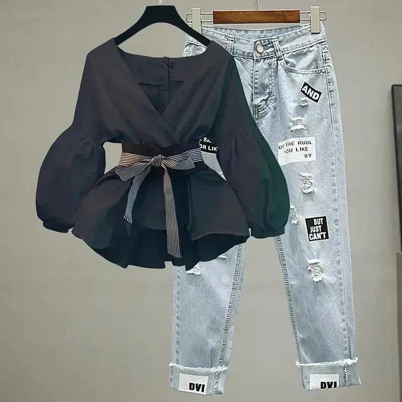 Black wrap top with bow belt and distressed patch jeans, women's fashion outfit