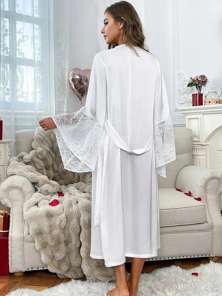 White lace-trimmed robe for women, elegant sleepwear with bell sleeves, cozy bedroom setting