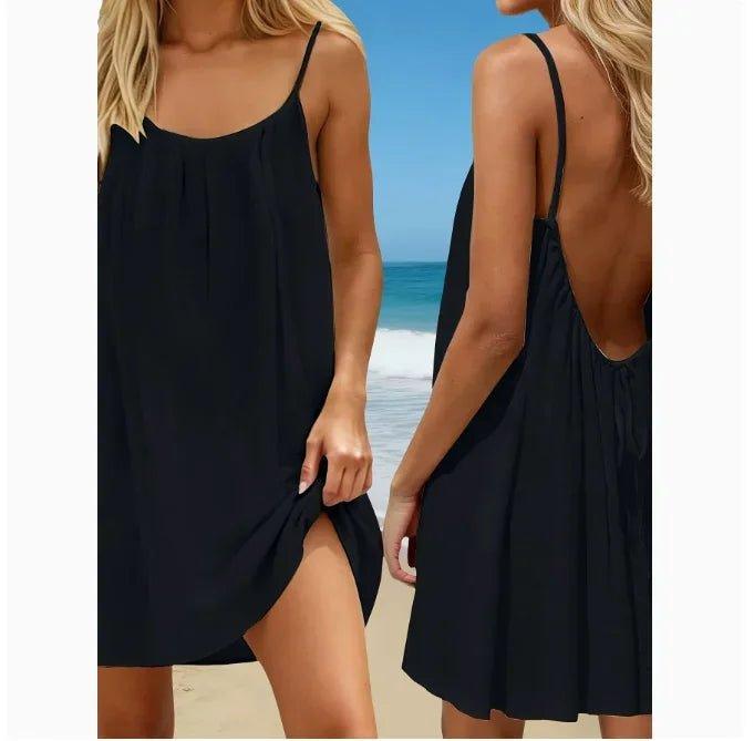 Black spaghetti strap beach dress with open back and side slit, perfect for summer fashion