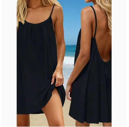 Black spaghetti strap beach dress with open back and side slit, perfect for summer fashion