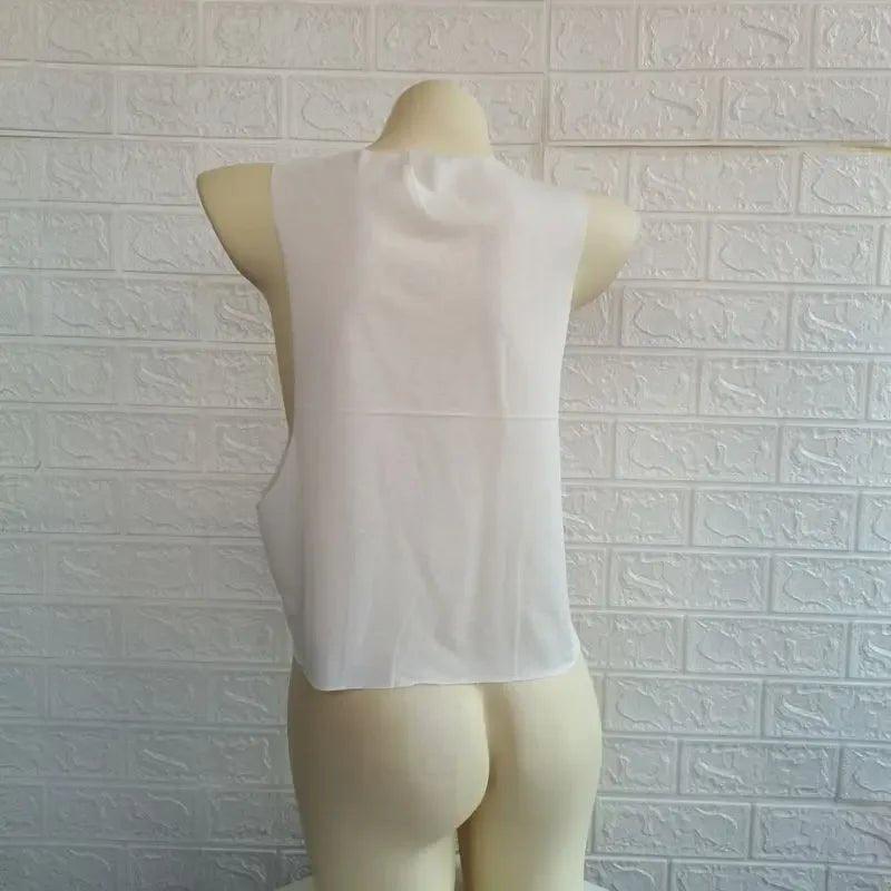 White sleeveless women's top on mannequin, back view, fashion store display