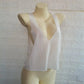 White sheer V-neck sleeveless top for women, fashion blouse on mannequin