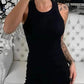 Woman in black sleeveless jumpsuit, stylish fashion outfit for everyday wear