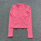 Pink women's long sleeve zip-up athletic top for fitness and fashion
