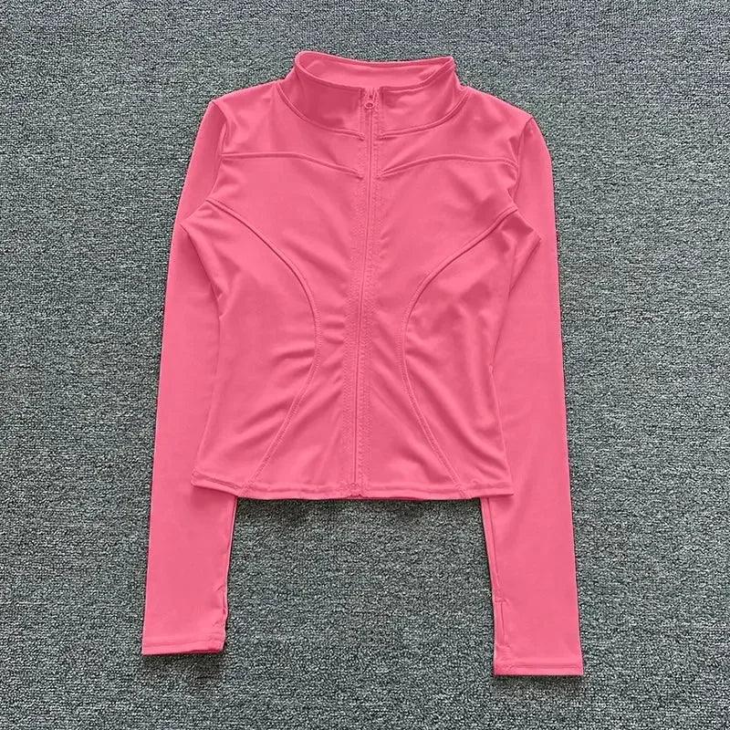 Pink women's long sleeve zip-up athletic top for fitness and fashion