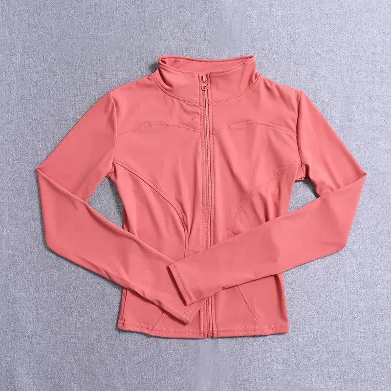Pink women's long-sleeve zip-up athletic jacket for fitness and fashion