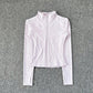 White women's athletic zip-up jacket with long sleeves and high neck, ideal for fitness and fashion