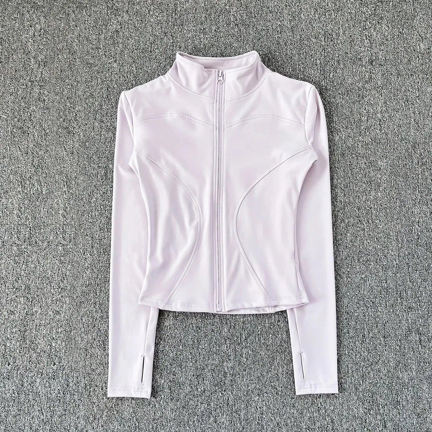 White women's athletic zip-up jacket with long sleeves and high neck, ideal for fitness and fashion