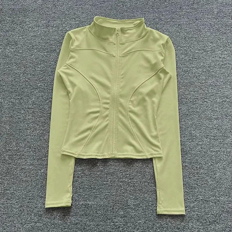 Light green women's long sleeve zip-up athletic top, perfect for fitness and active wear