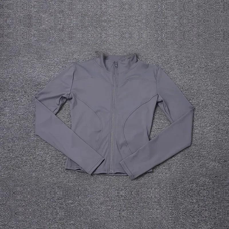 Gray women's long sleeve zip-up athletic jacket for fitness and casual wear