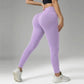 Purple ribbed high-waist leggings for women, fitness wear with white sneakers