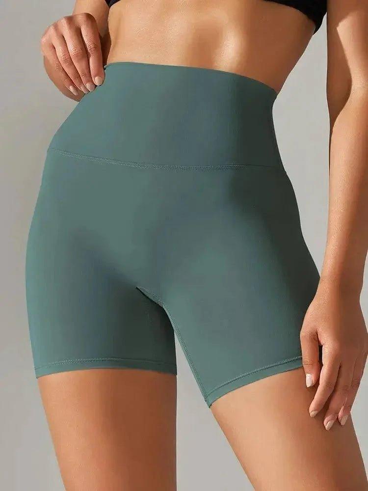 High-waisted teal biker shorts for women's fashion and fitness