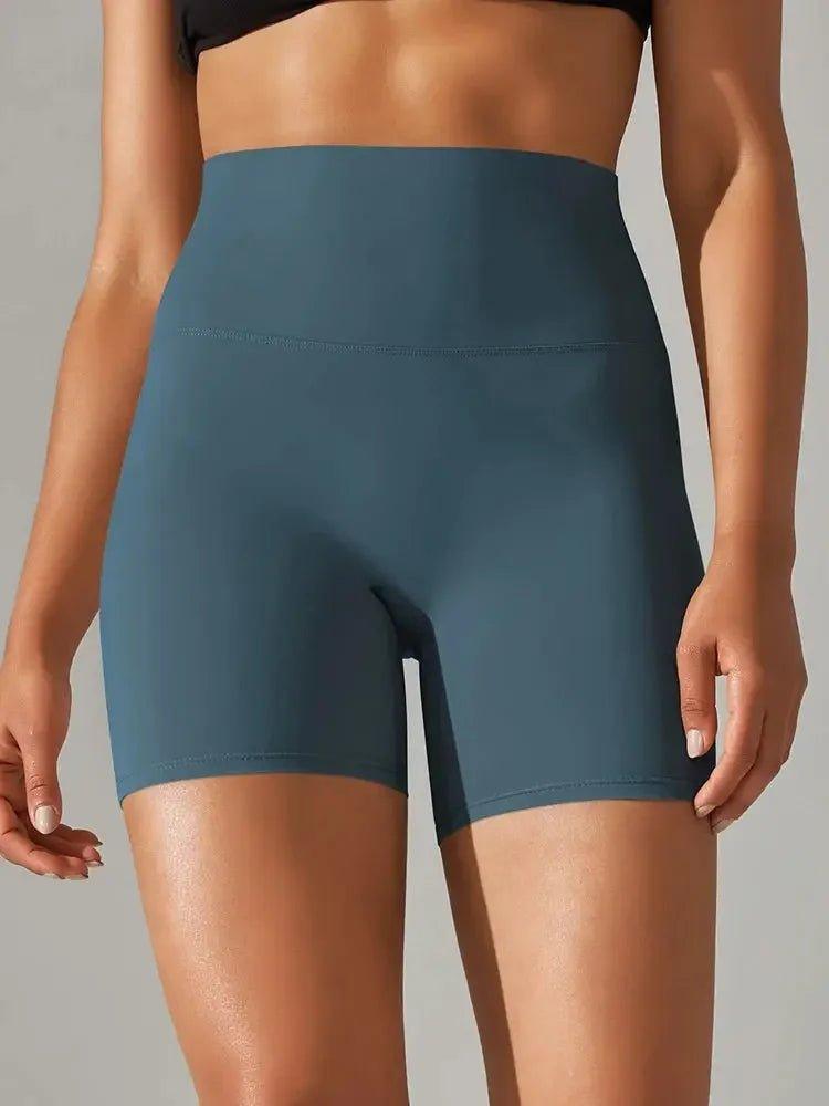 High-waisted teal biker shorts for women's fashion and fitness