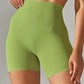 Green high-waisted biker shorts for women's fashion and fitness