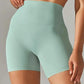 Mint green high-waisted women's biker shorts for fitness and fashion