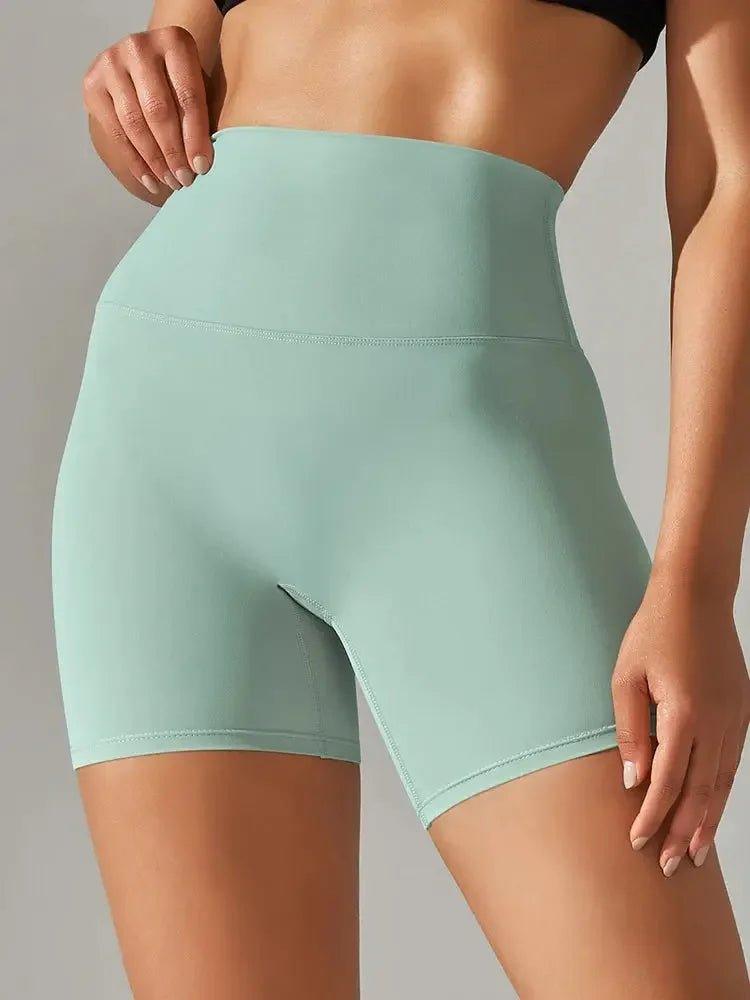 Mint green high-waisted women's biker shorts for fitness and fashion