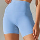 Light blue high-waisted women's biker shorts for fitness and fashion