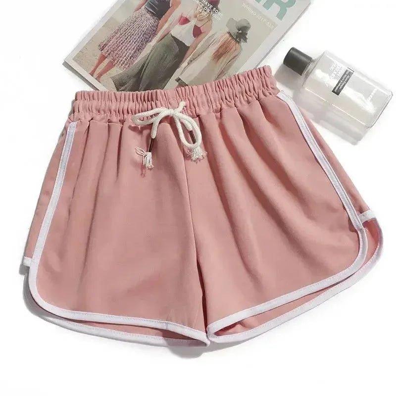 Pink drawstring shorts with white trim, fashion lounge wear for women