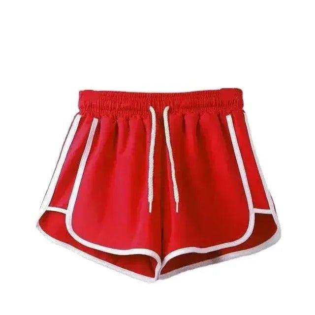 Red women's athletic shorts with white trim and drawstring waist, ideal for casual or workout wear.