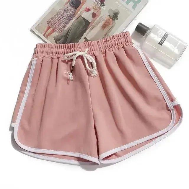 Pink women's drawstring shorts with white trim, fashion lounge wear