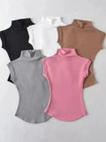 Women's sleeveless turtleneck tops in black, white, brown, gray, and pink — stylish fashion essentials