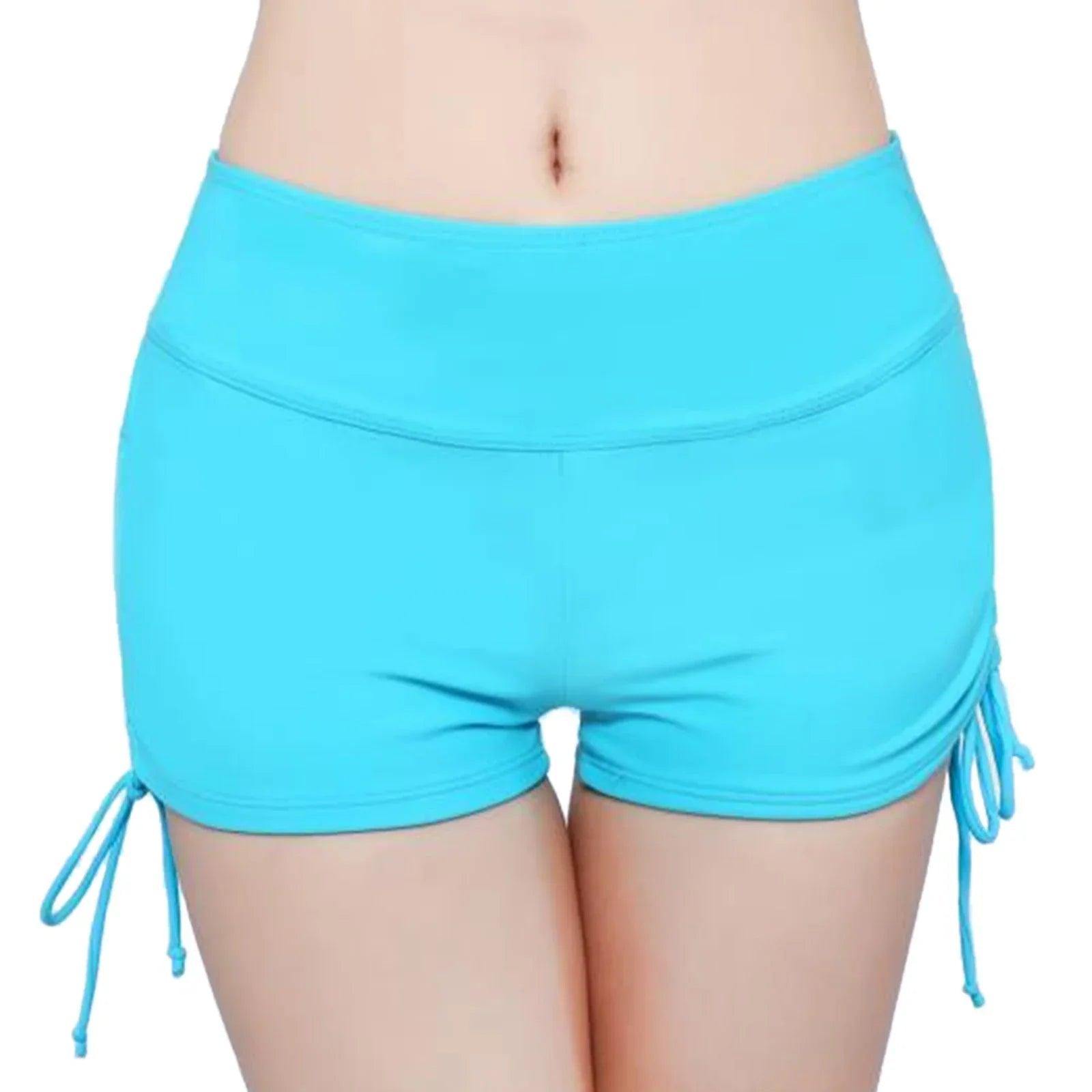 Women's turquoise drawstring shorts, stylish and comfortable fashion wear for casual or active use.