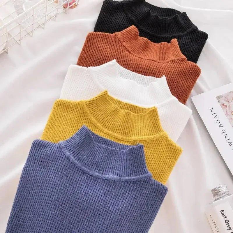 Women's ribbed turtleneck sweaters in black, rust, white, yellow, and blue, perfect for fashion layering.