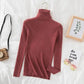 Women's ribbed turtleneck sweater in dusty rose, stylish fall fashion top with cozy texture
