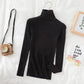 Black ribbed turtleneck sweater for women, stylish long sleeve top with camera and sunglasses accessory