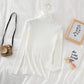 White ribbed turtleneck sweater with stylish accessories for women's fashion