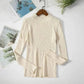 Cream ribbed turtleneck sweater for women, long sleeve fashion top on hanger with magazine backdrop
