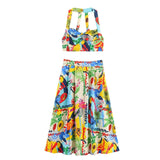 Tropical print women's two-piece set with halter top and midi skirt, vibrant summer fashion