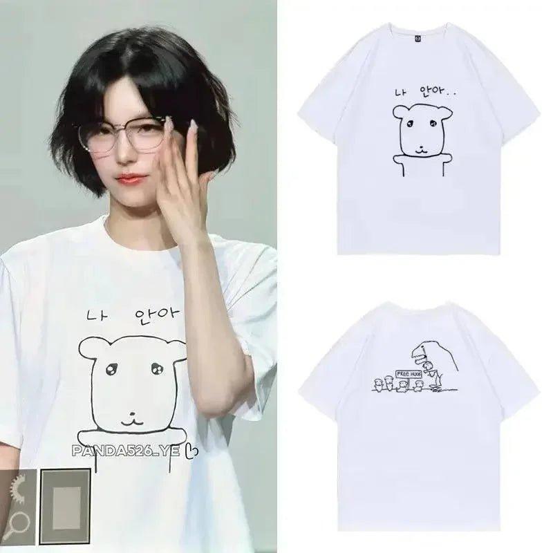 Woman wearing cute white graphic tee with cartoon bear and Korean text, fashion t-shirt for women