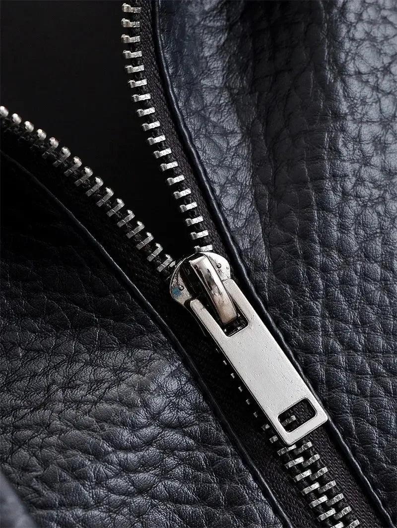 Black leather jacket with silver zipper detail, women's fashion
