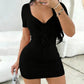 Black ribbed mini dress with lace-up front, short sleeves, and V-neck for women's fashion