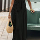 Woman in black spaghetti strap maxi dress with woven bag, summer fashion outfit