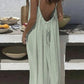 Woman in mint green backless maxi dress, summer fashion, beach style, casual elegance