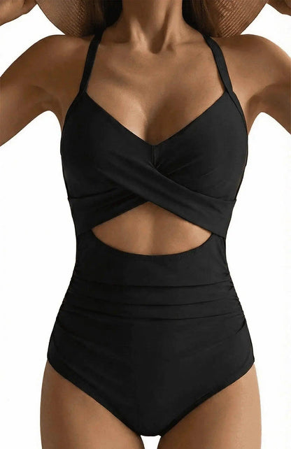 Black one-piece swimsuit with crisscross front and waist cutout, stylish women's beachwear