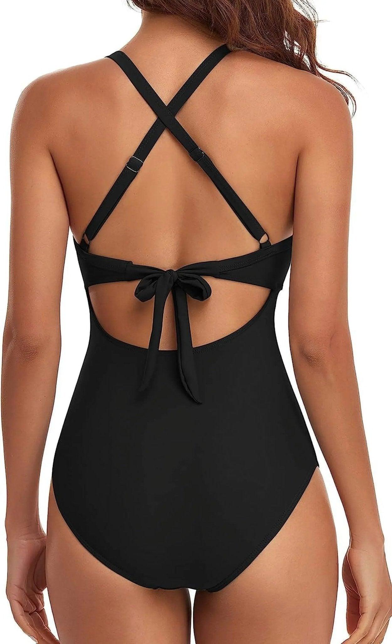 Black one-piece swimsuit with crisscross back and bow detail