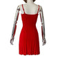 Red spaghetti strap dress on mannequin with metallic arms, women's fashion